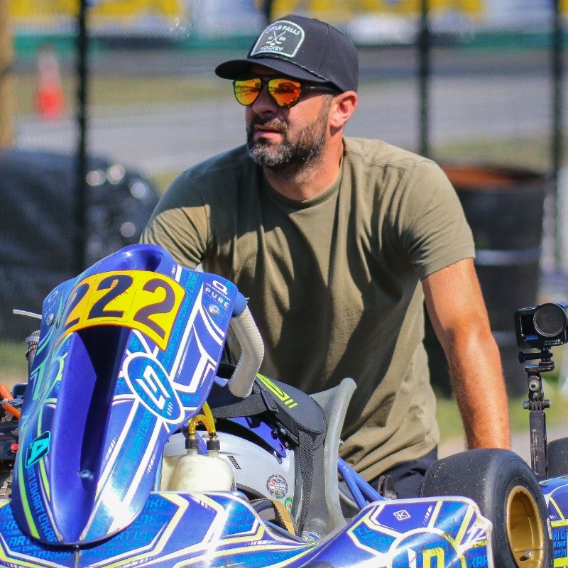 Nick in the paddock with the #22 kart